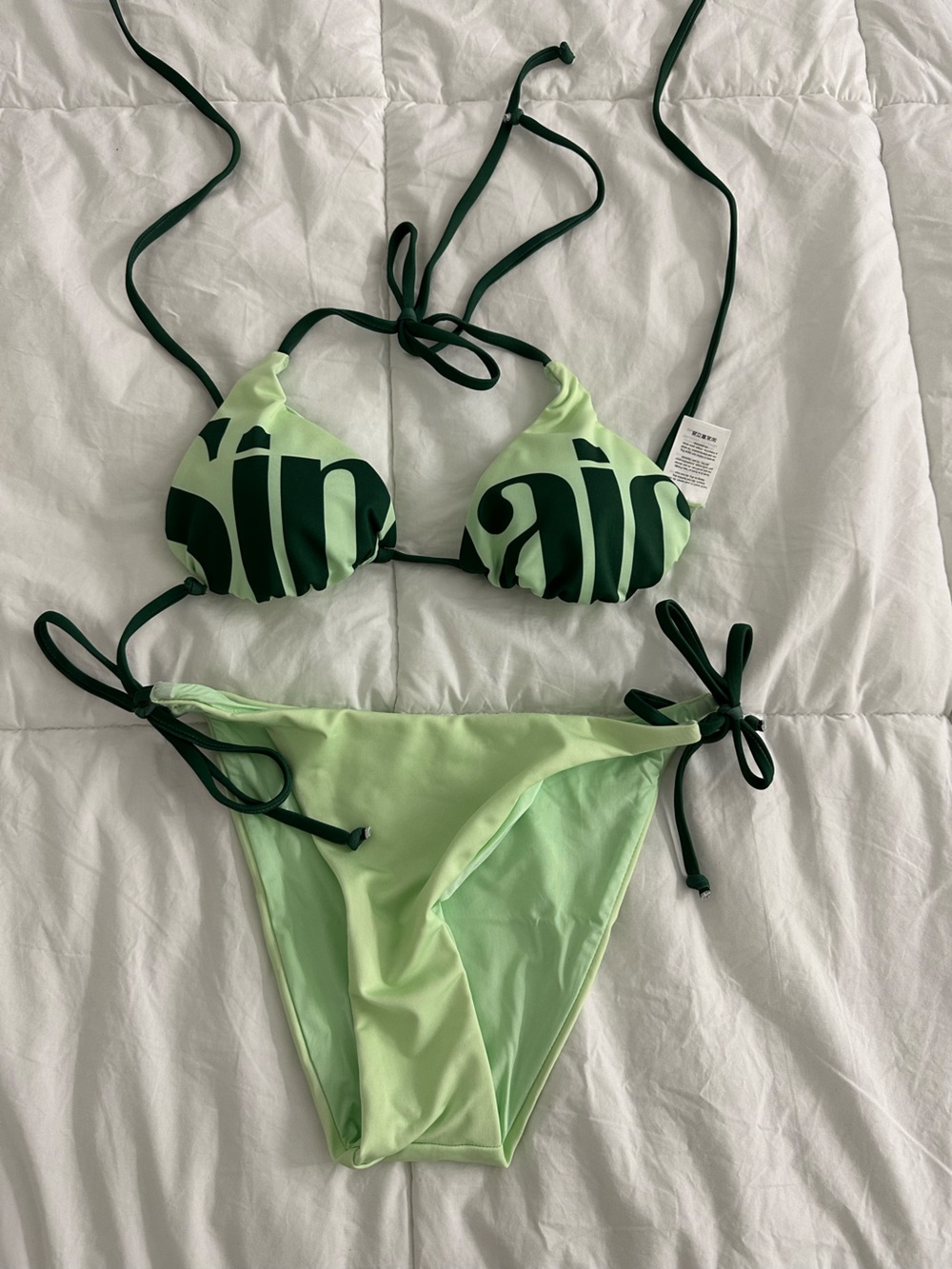 Green Two-Piece Bikini with Dark Green Script Accents